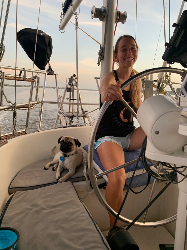 Tory and Moses as we motor the St. Johns River to the Atlantic Ocean